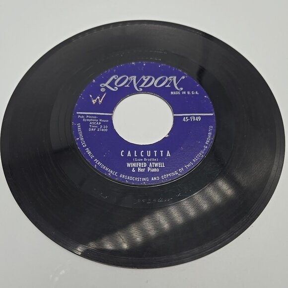 Calcutta / Melody In G Winifred Atwell and Her Piano 45 RPM Vinyl Record - Picture 1 of 4